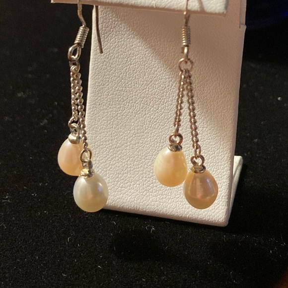 Freshwater Pearls on a chain. Cream coloured pearls on hooks